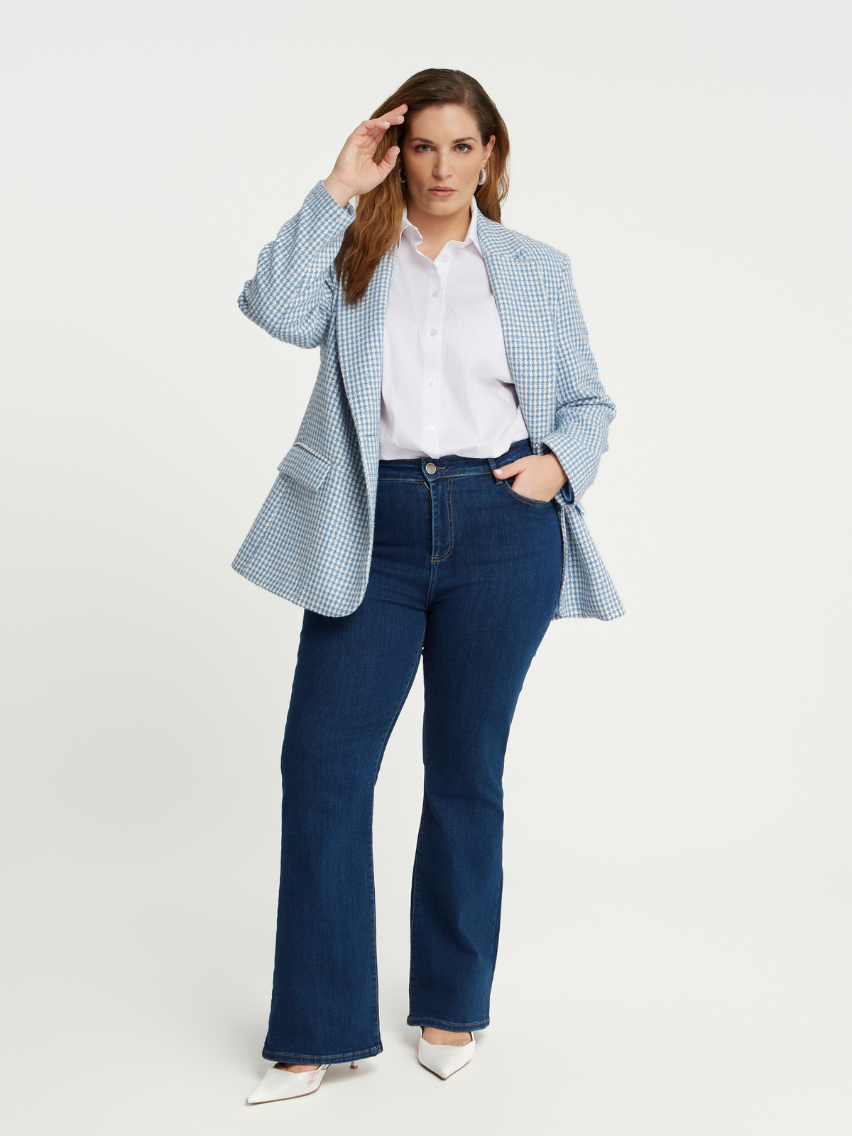 Τζιν μπλε σε γραμμή bootcut φωτογραφία