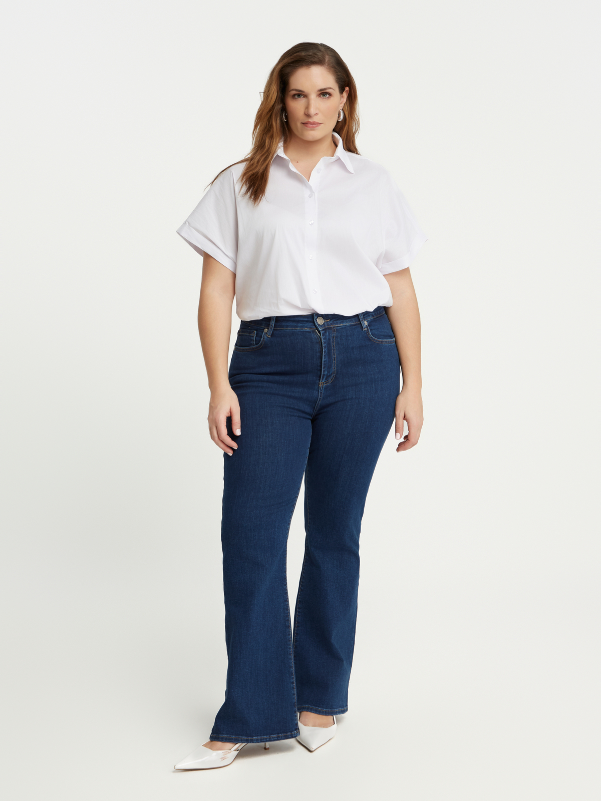 Τζιν μπλε σε γραμμή bootcut φωτογραφία