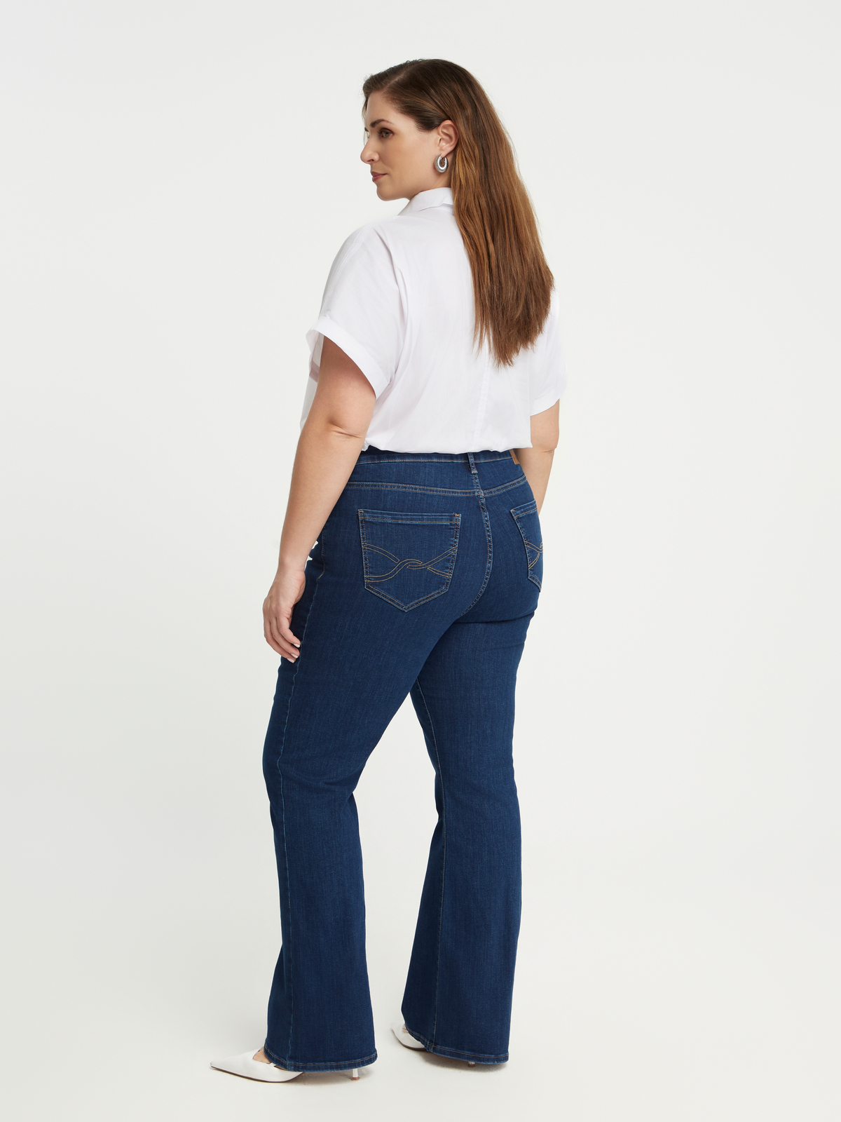 Τζιν μπλε σε γραμμή bootcut φωτογραφία