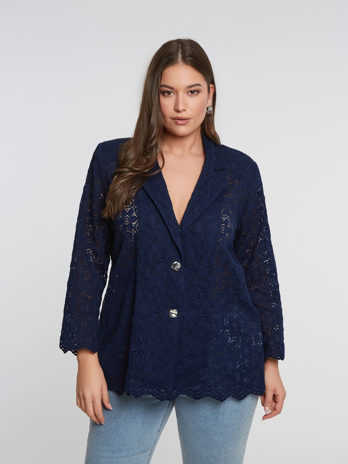 Μπλε σακάκι δαντέλα με γεωμετρικά κουμπιά φωτογραφία