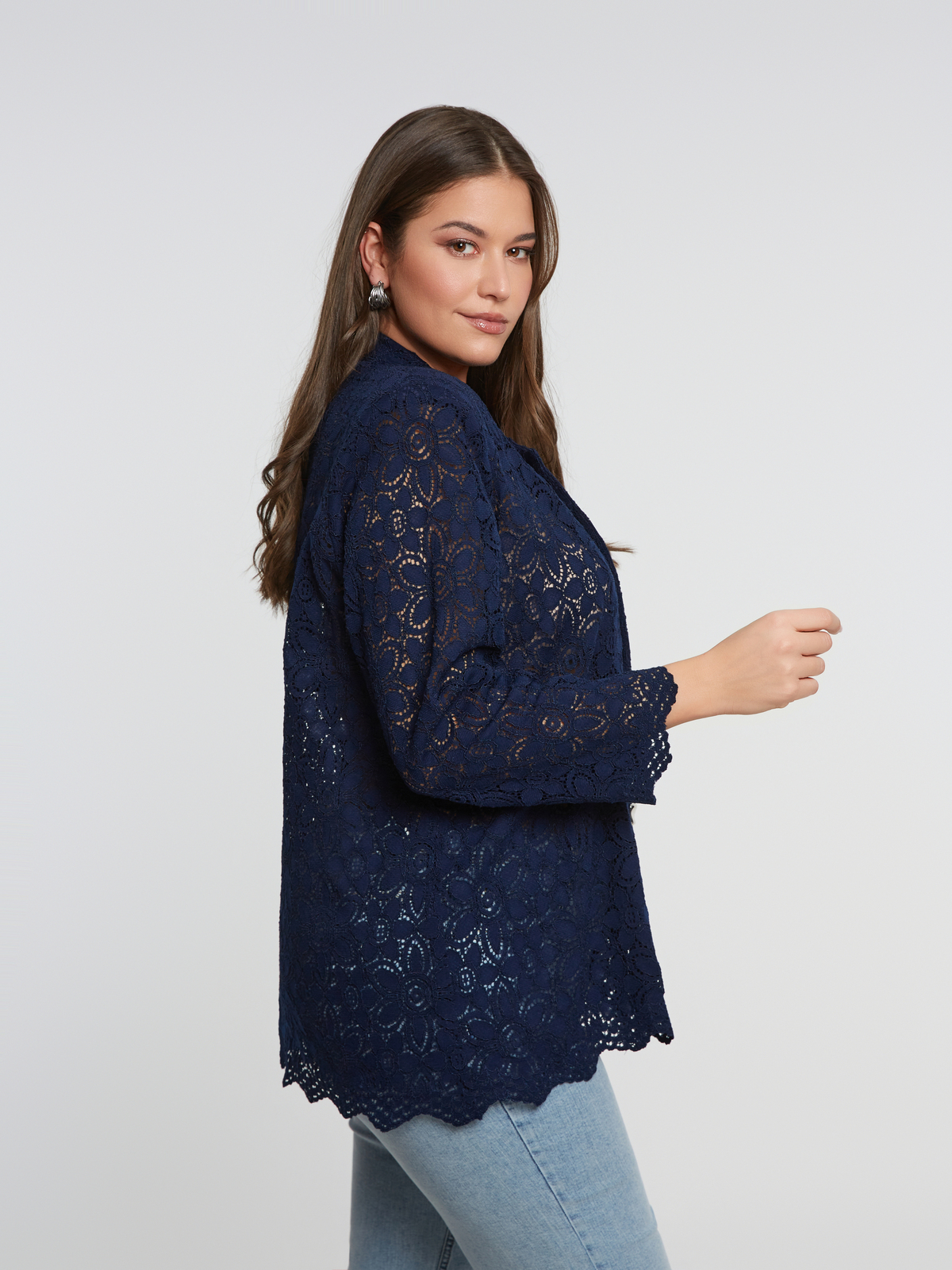 Μπλε σακάκι δαντέλα με γεωμετρικά κουμπιά φωτογραφία