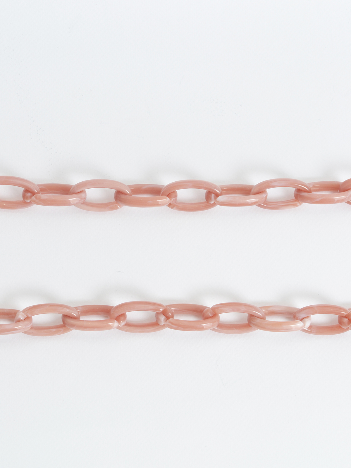 Κοκκάλινη αλυσίδα γυαλιών φωτογραφία