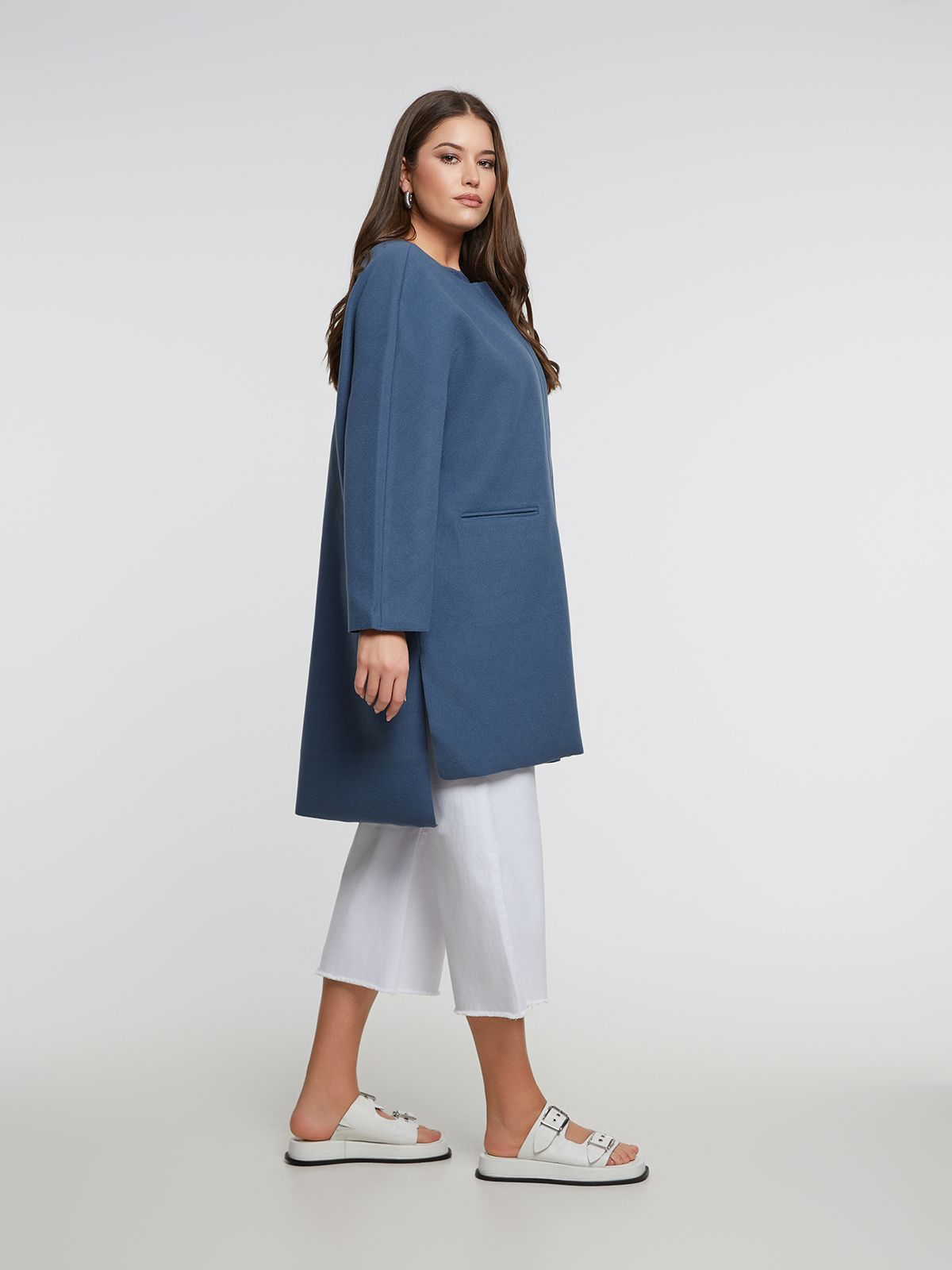 Oversized coat with button-up closure