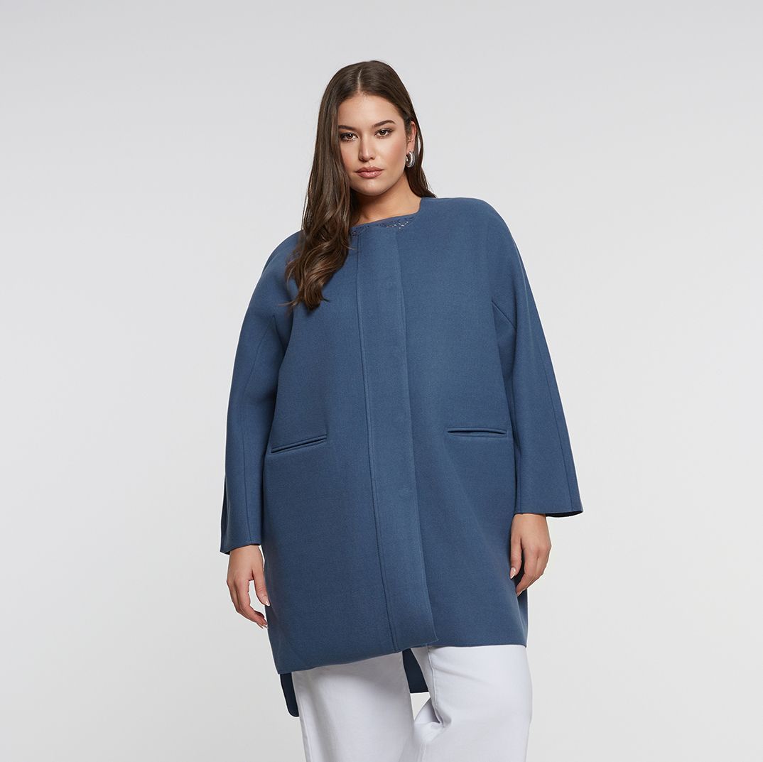 Oversized coat with button-up closure