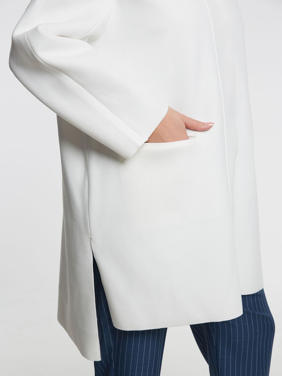 Oversized coat with button-up closure