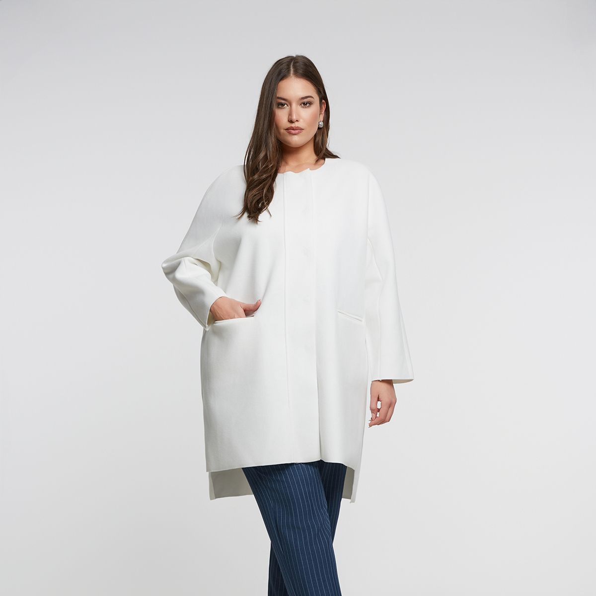 Oversized coat with button-up closure