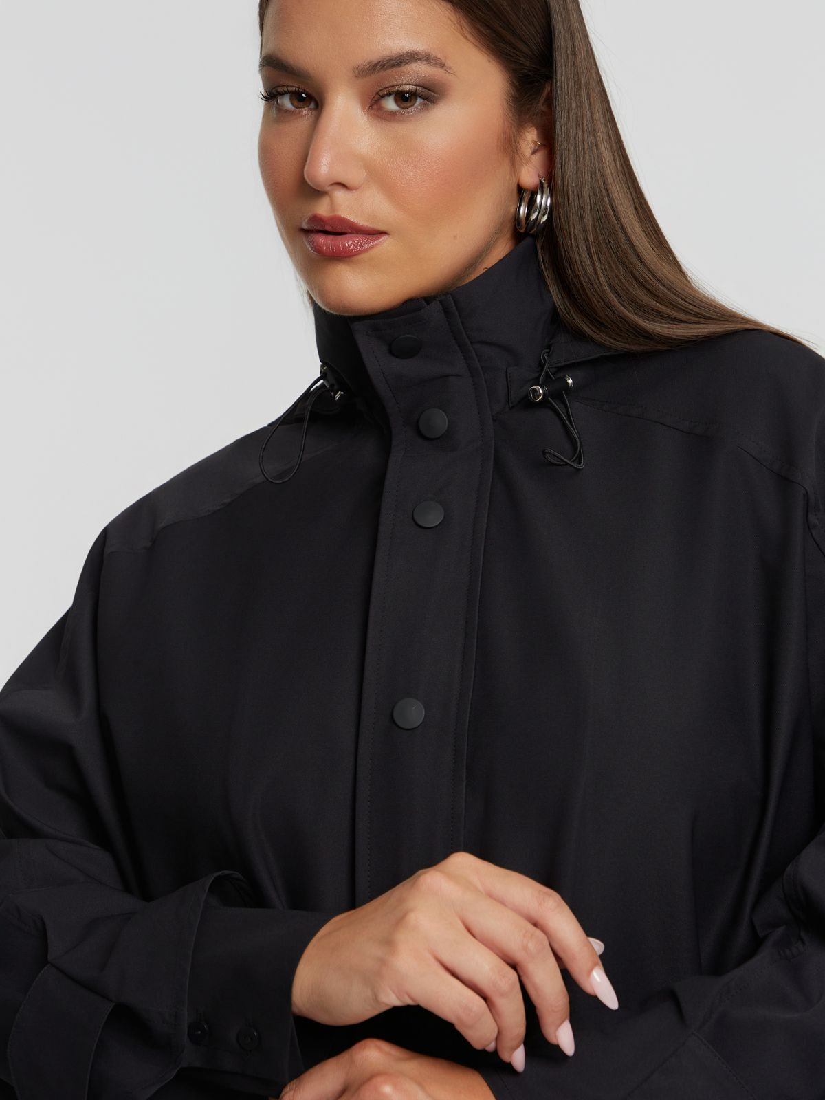 Oversized utility coat with high neck and pockets