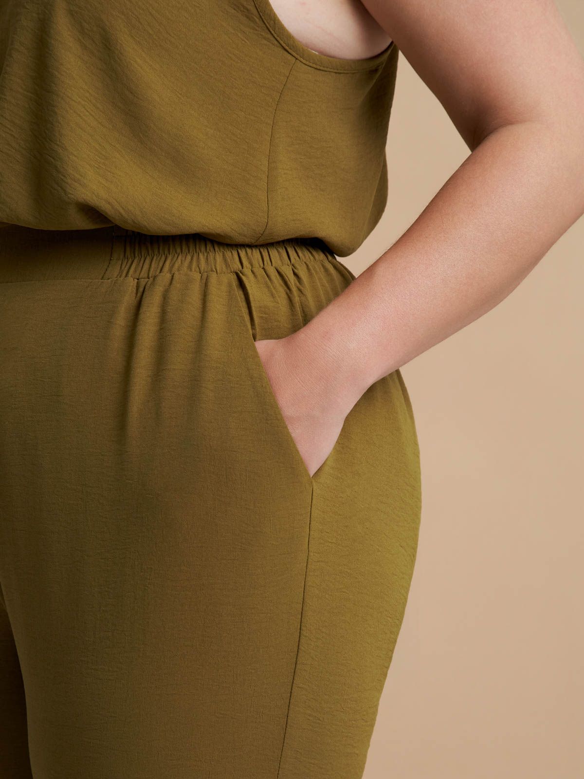 Airwashed crepe tapered-leg trousers