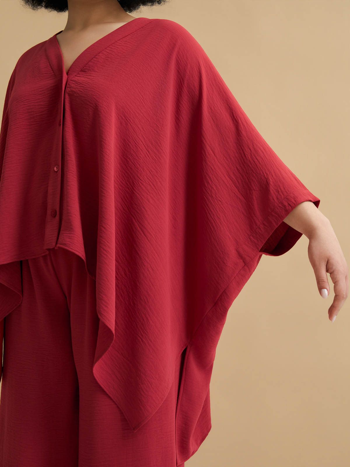 Airwashed crepe V-neck shirt with dipped sides