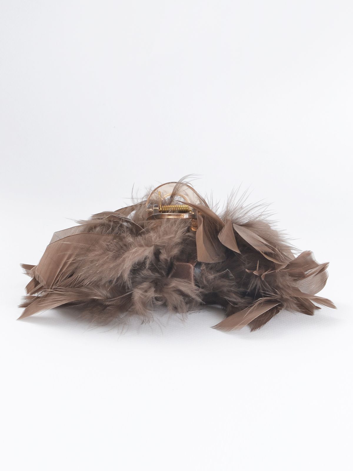 Brown feather hair claw