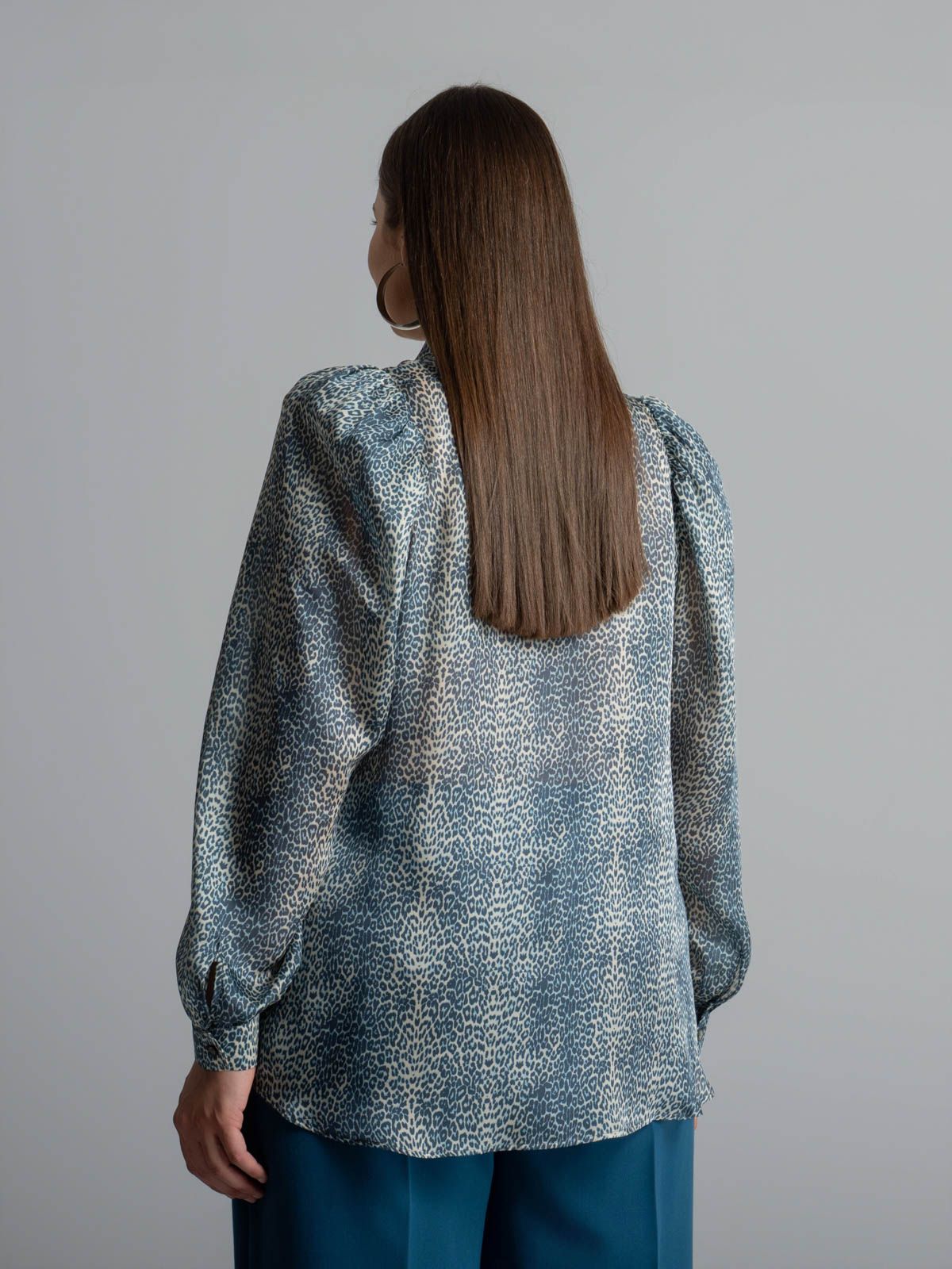Animal print shirt with bow neckline