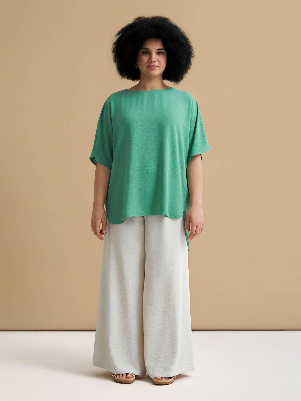 Crepe blouse with dipped back