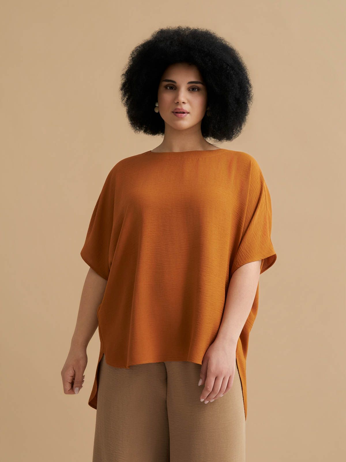 Crepe blouse with dipped back