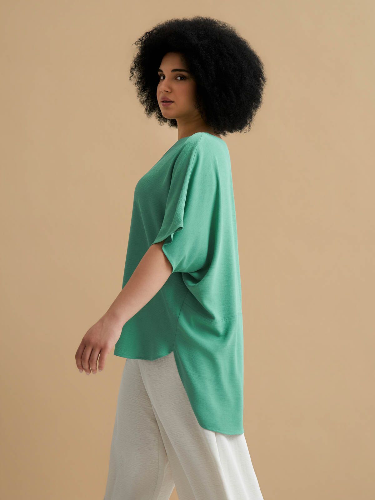 Crepe blouse with dipped back