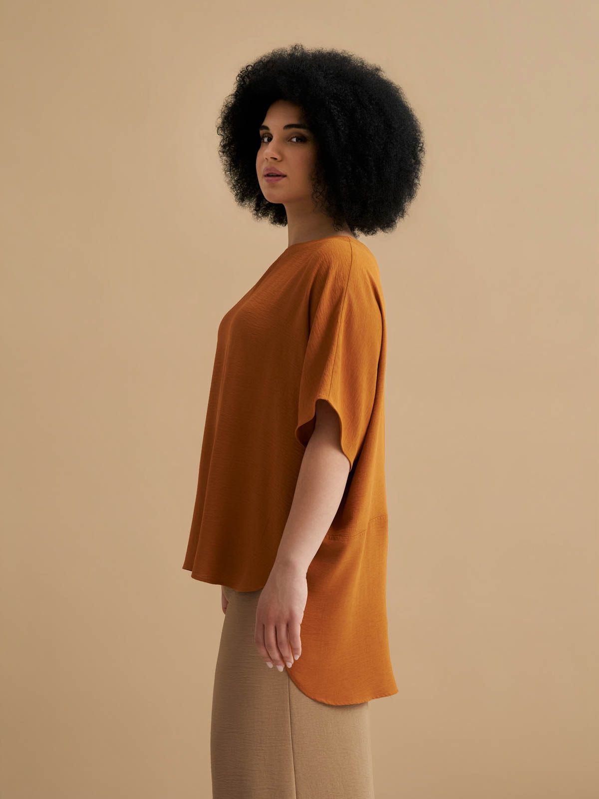 Crepe blouse with dipped back
