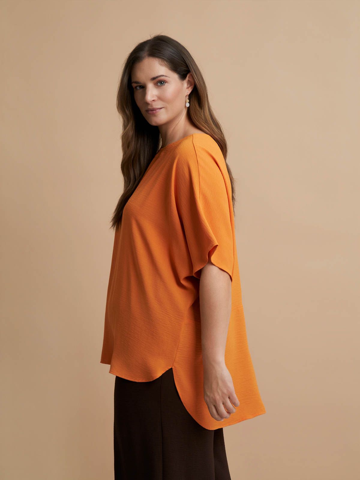 Crepe blouse with dipped back
