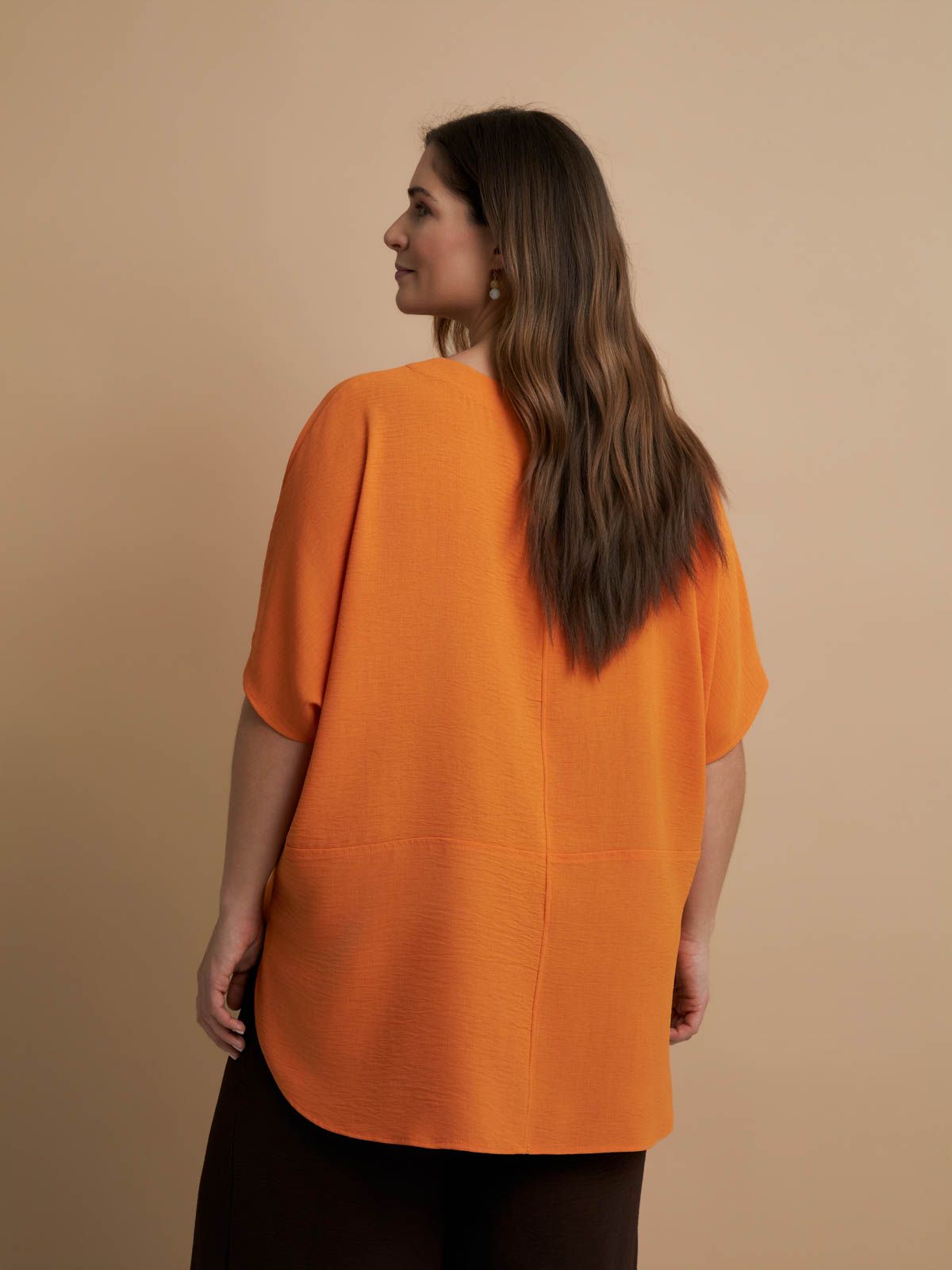 Crepe blouse with dipped back