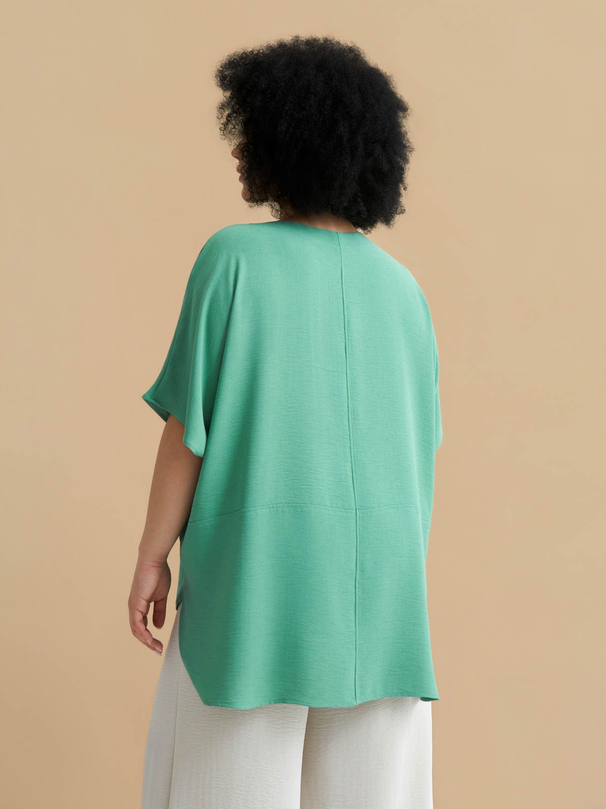 Crepe blouse with dipped back