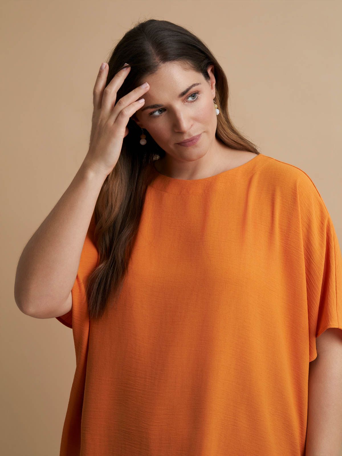 Crepe blouse with dipped back