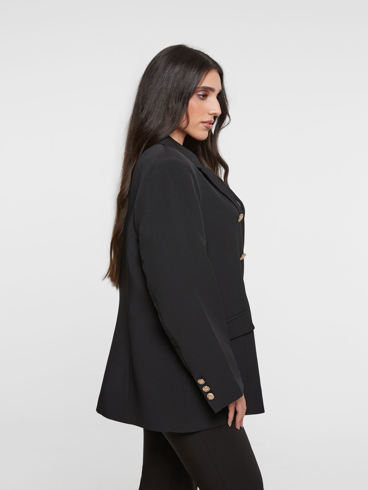 Double-breasted black blazer with gold buttons