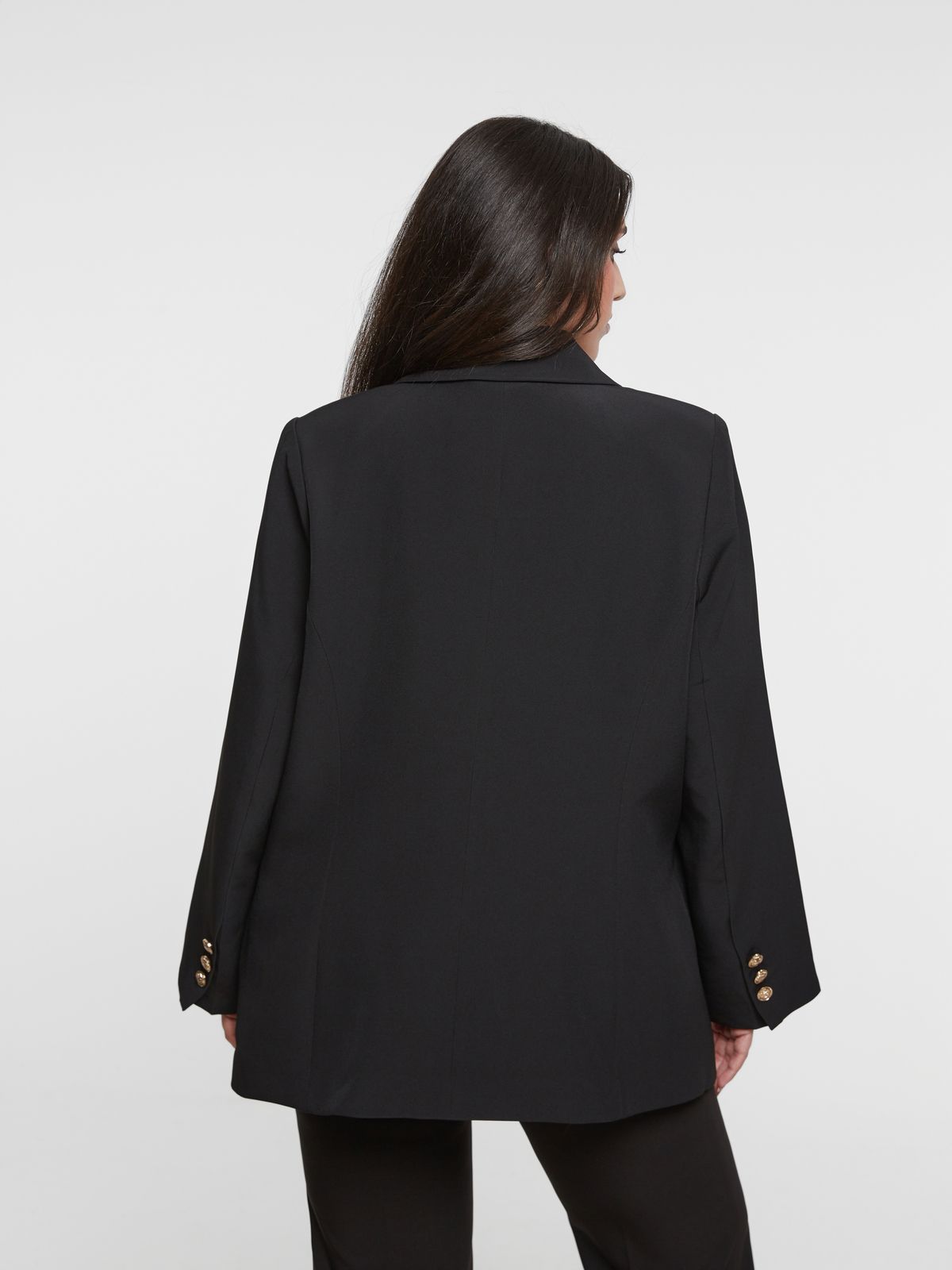 Double-breasted black blazer with gold buttons