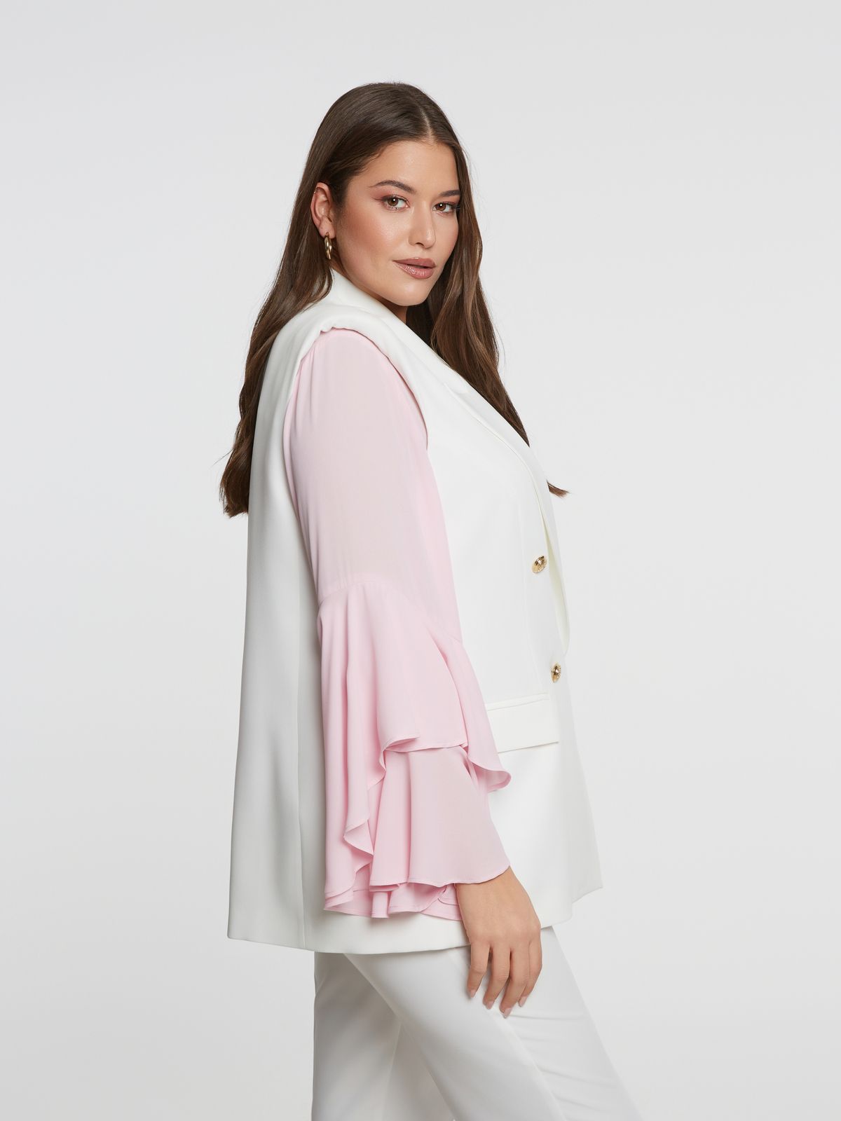 Double-breasted sleeveless blazer with structured lapels