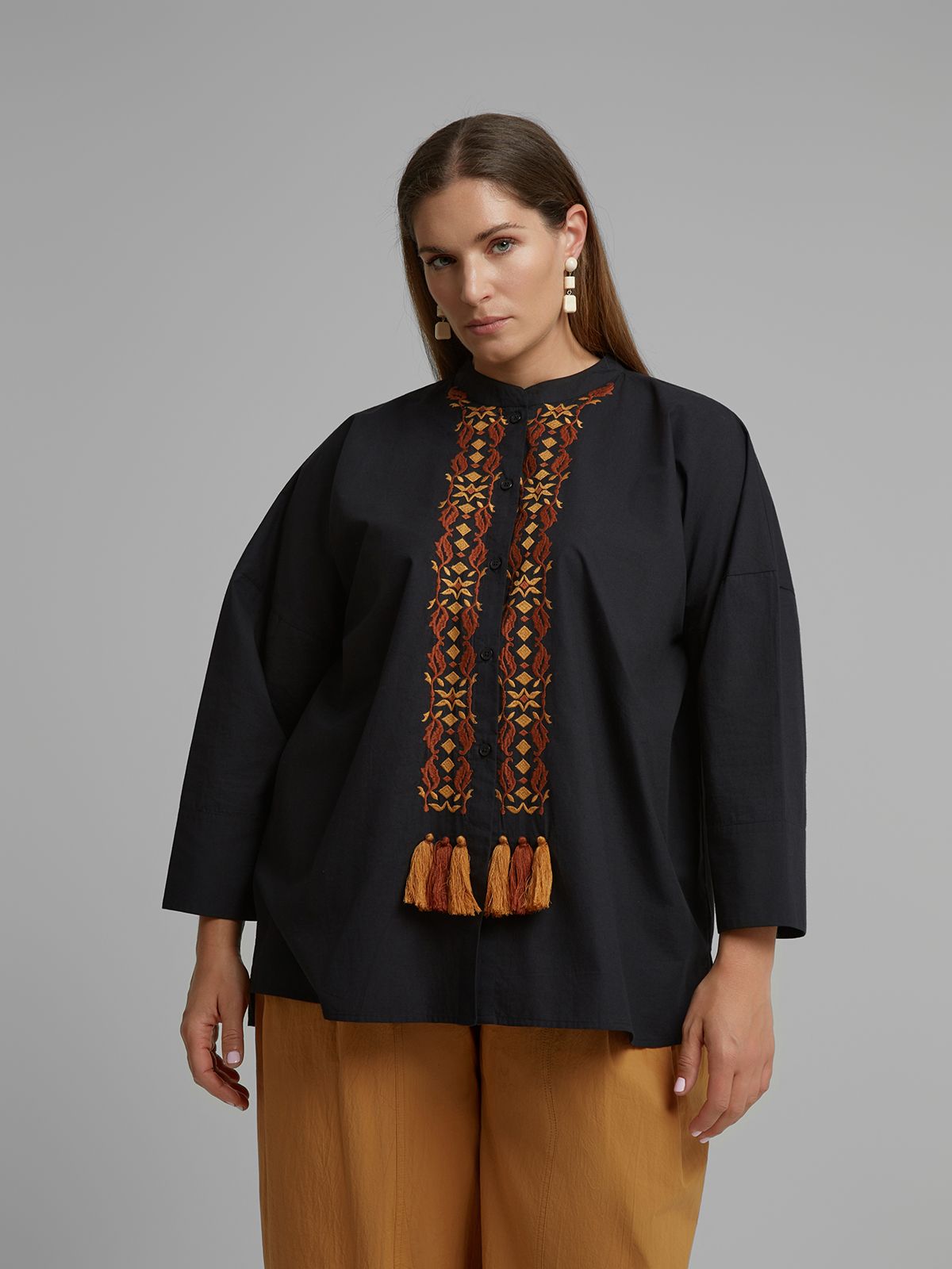 Embroidered shirt with tassel detail