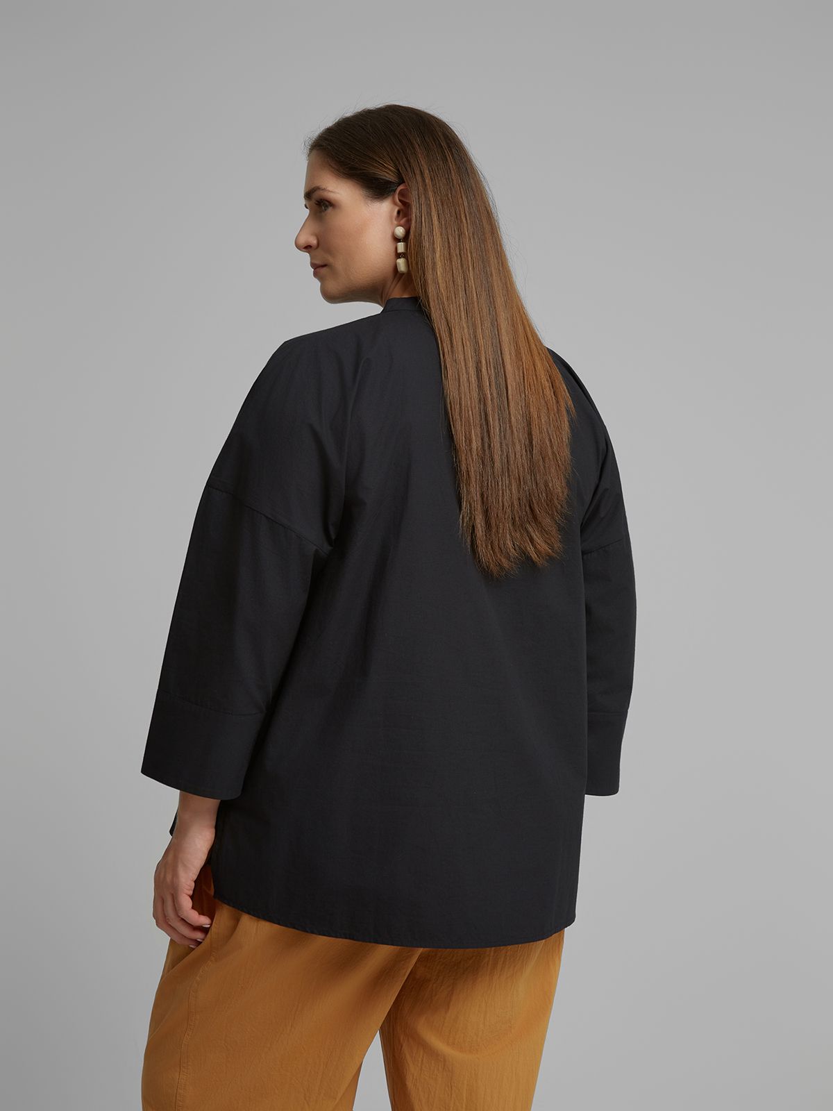 Embroidered shirt with tassel detail