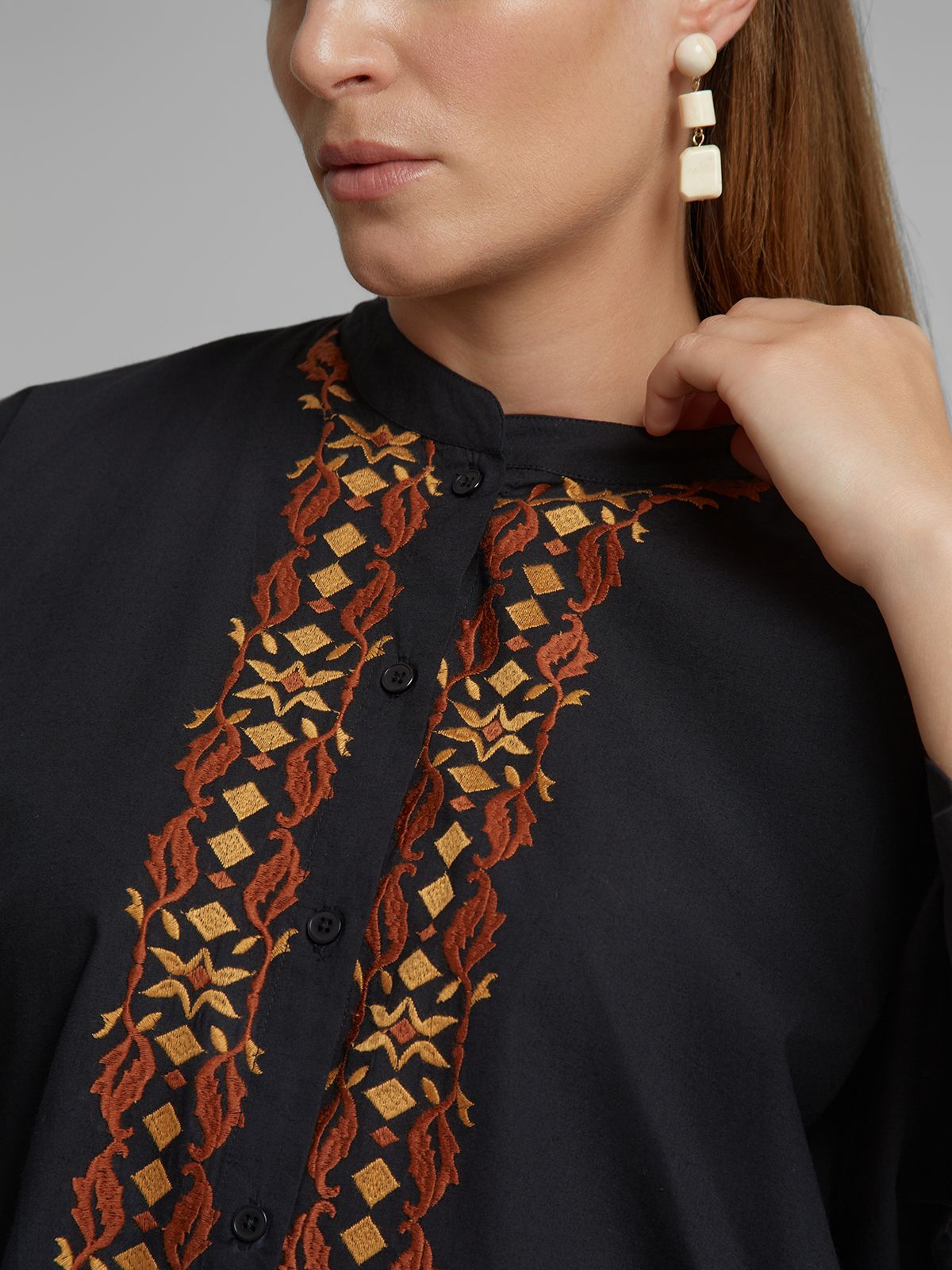 Embroidered shirt with tassel detail