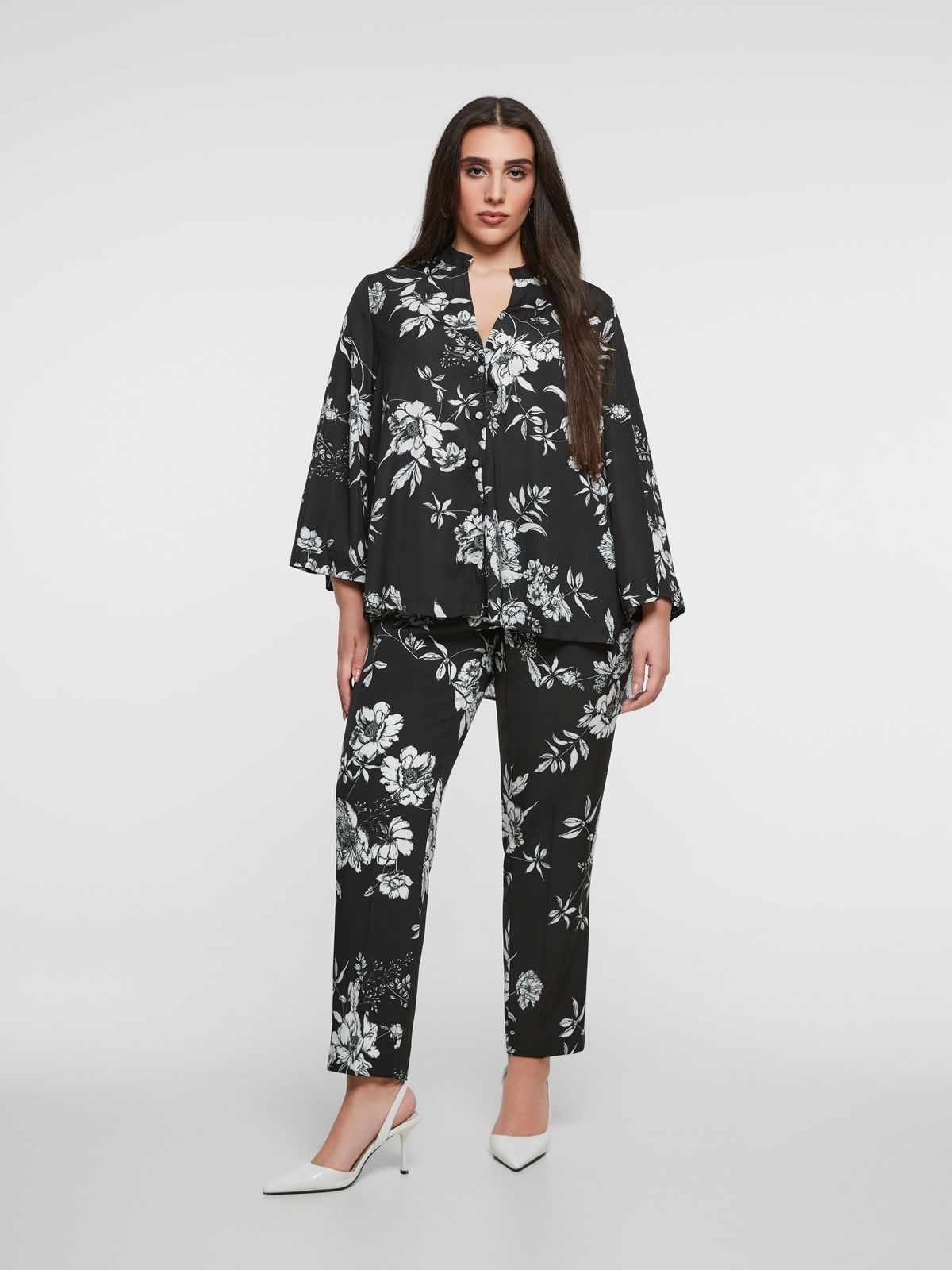 Floral printed button-down shirt with wide sleeves