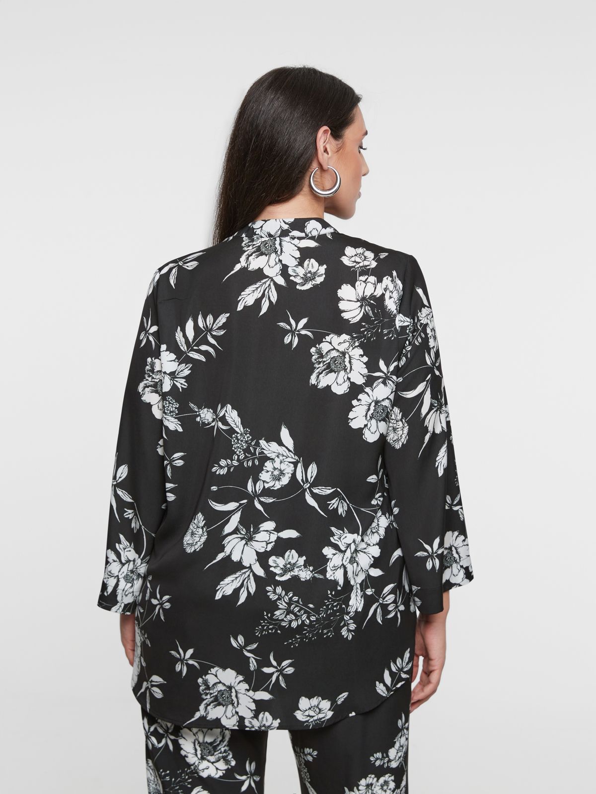 Floral printed button-down shirt with wide sleeves