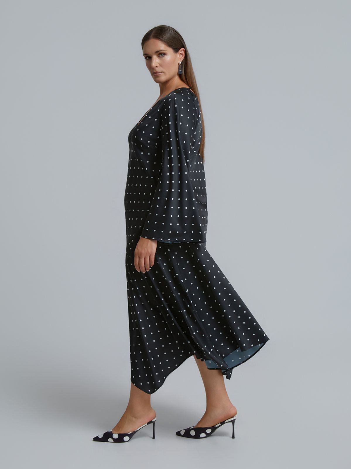 Polka dot satin dress with asymmetric hem