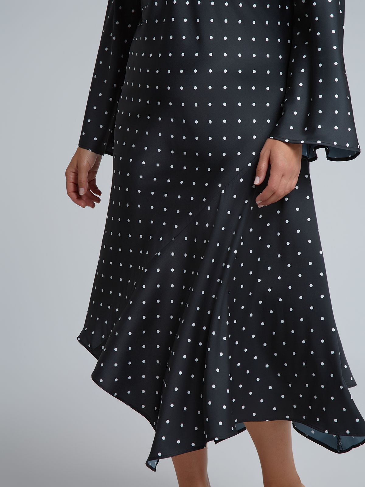 Polka dot satin dress with asymmetric hem