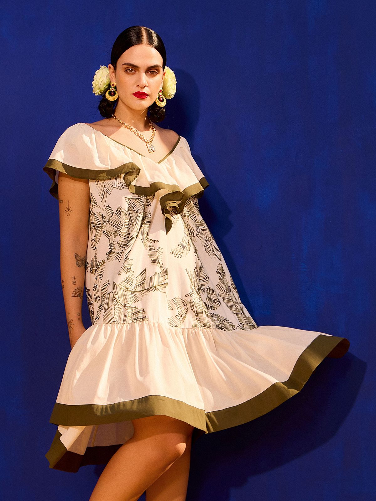 Embroidered cotton dress with ruffle neckline