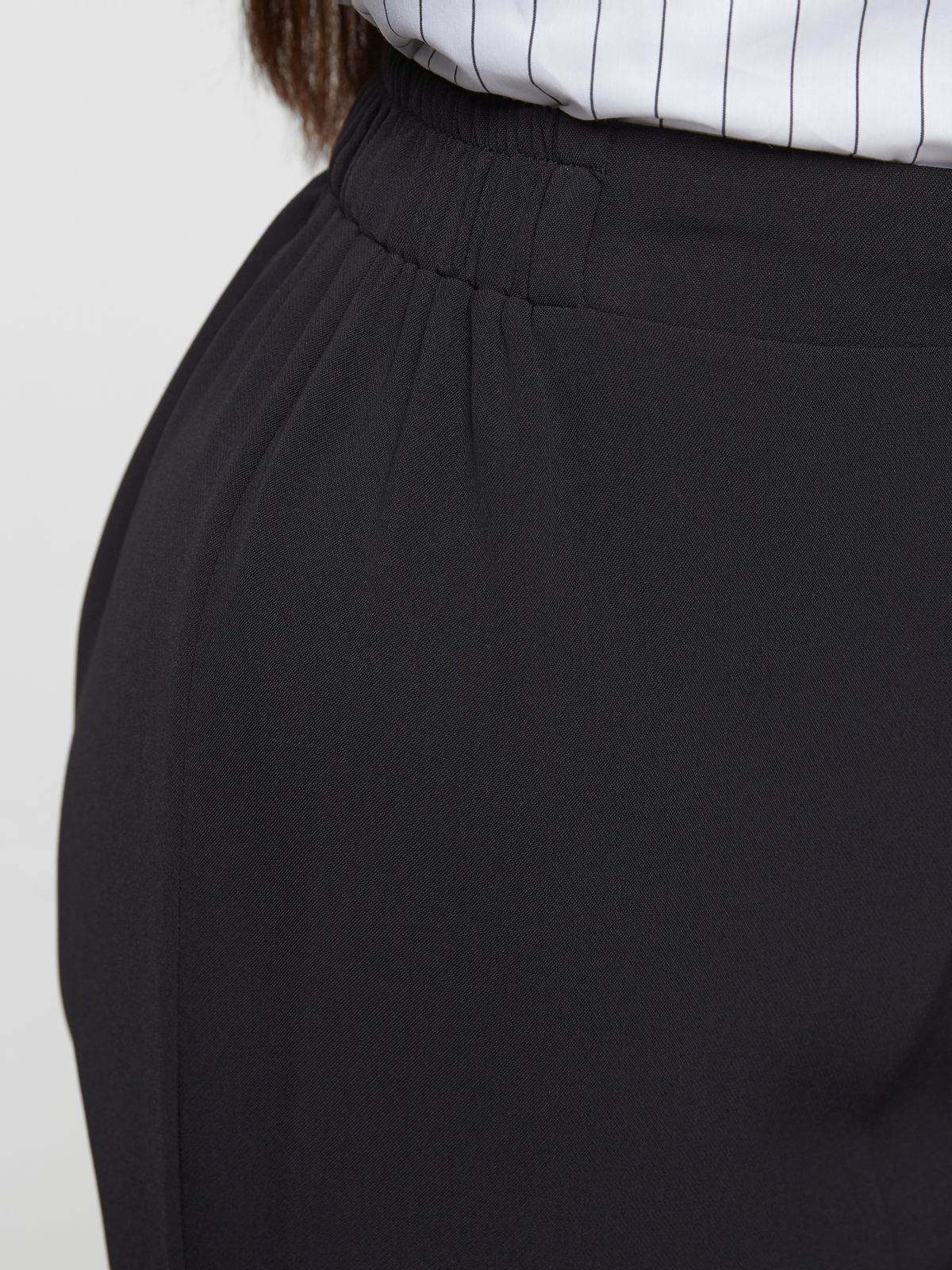High-waisted cigarette pants