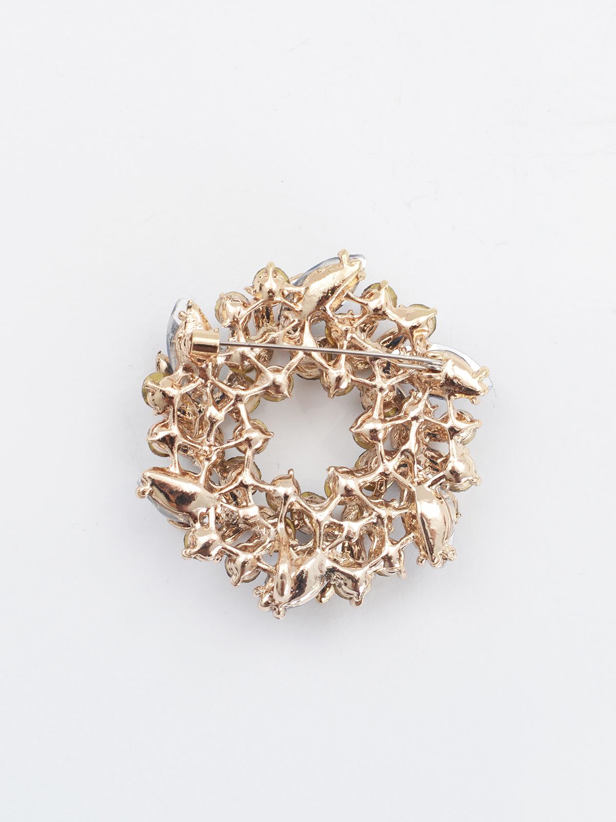 Wreath brooch with blue & white crystals