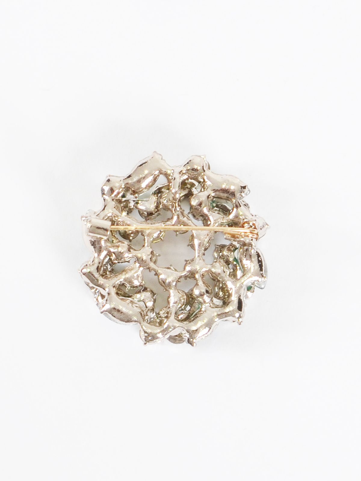 Emerald green wreath brooch with crystal-embellished leaf motif 