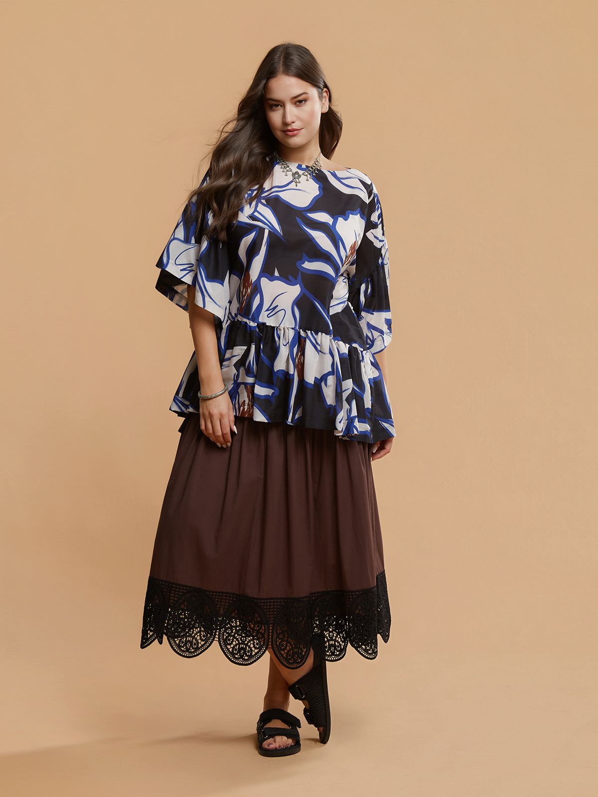 Printed fluid blouse with ruffled sleeves & hem