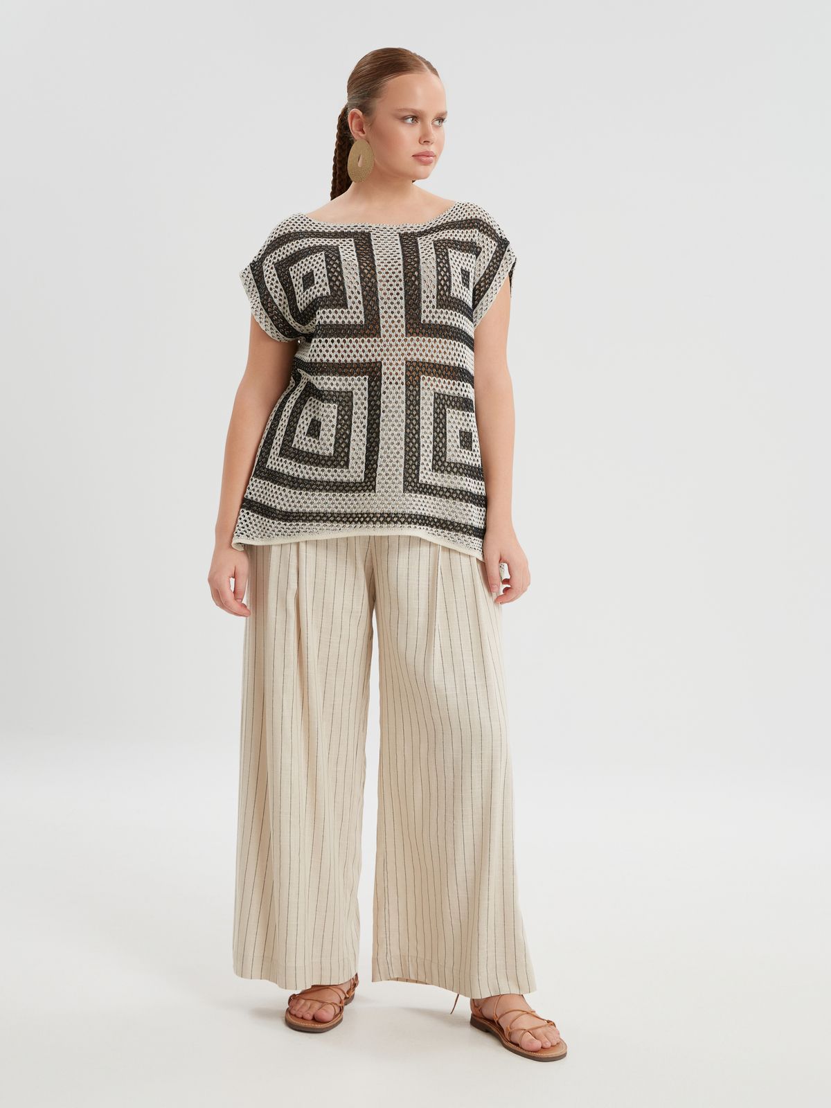 Geometric open-knit top