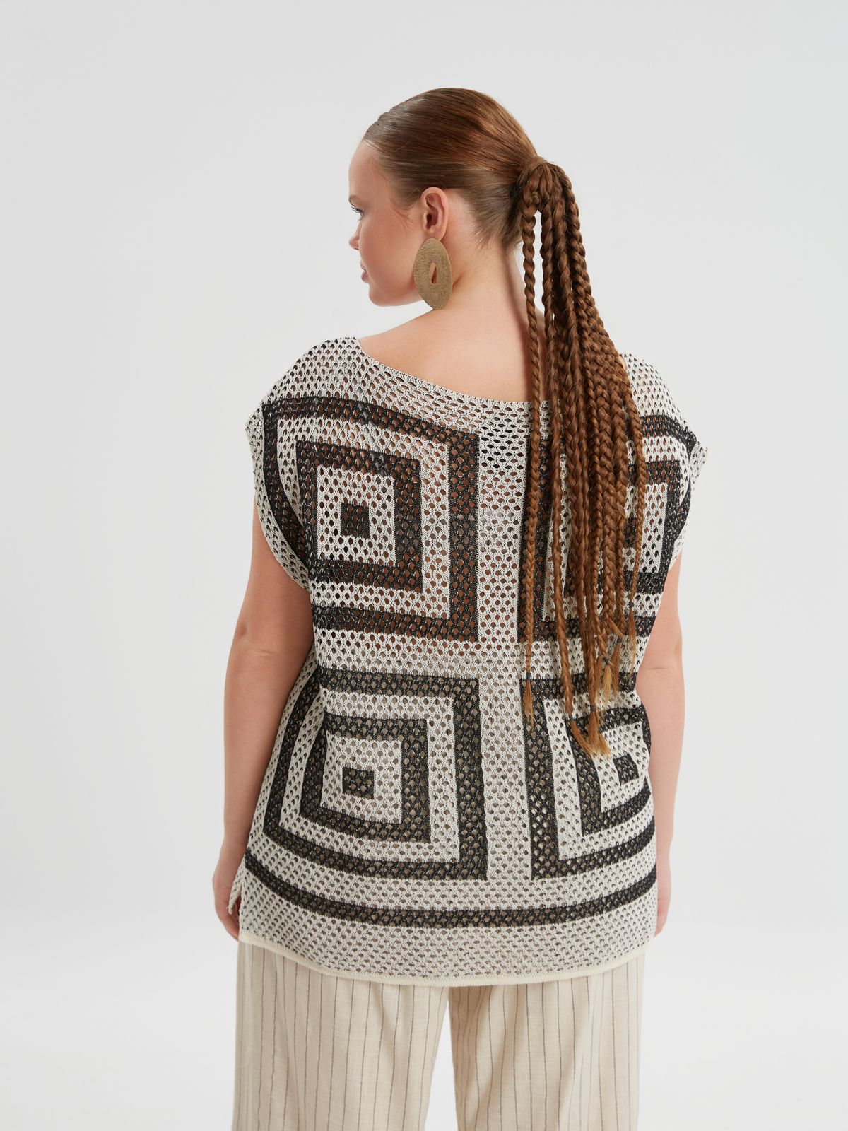 Geometric open-knit top