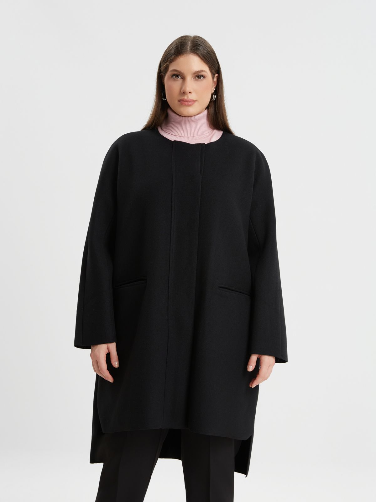 Oversized coat with button-up closure