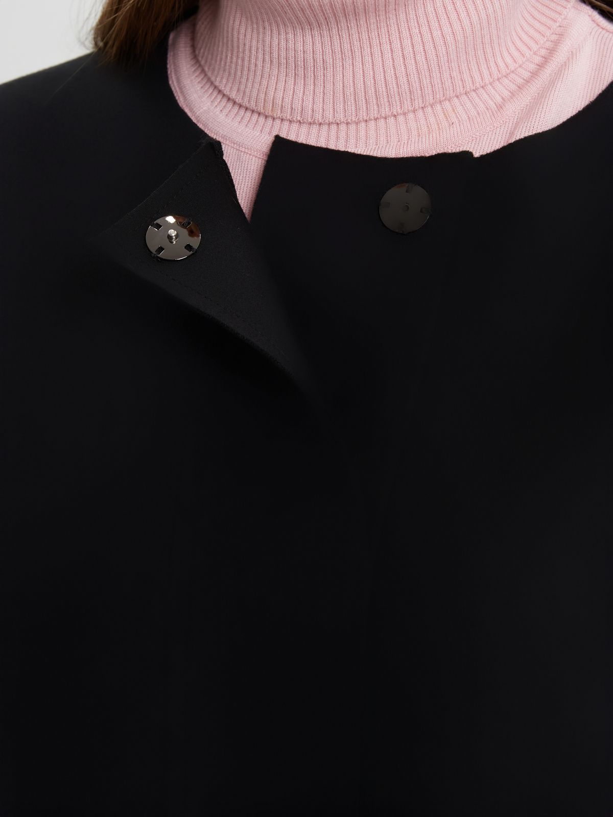 Oversized coat with button-up closure