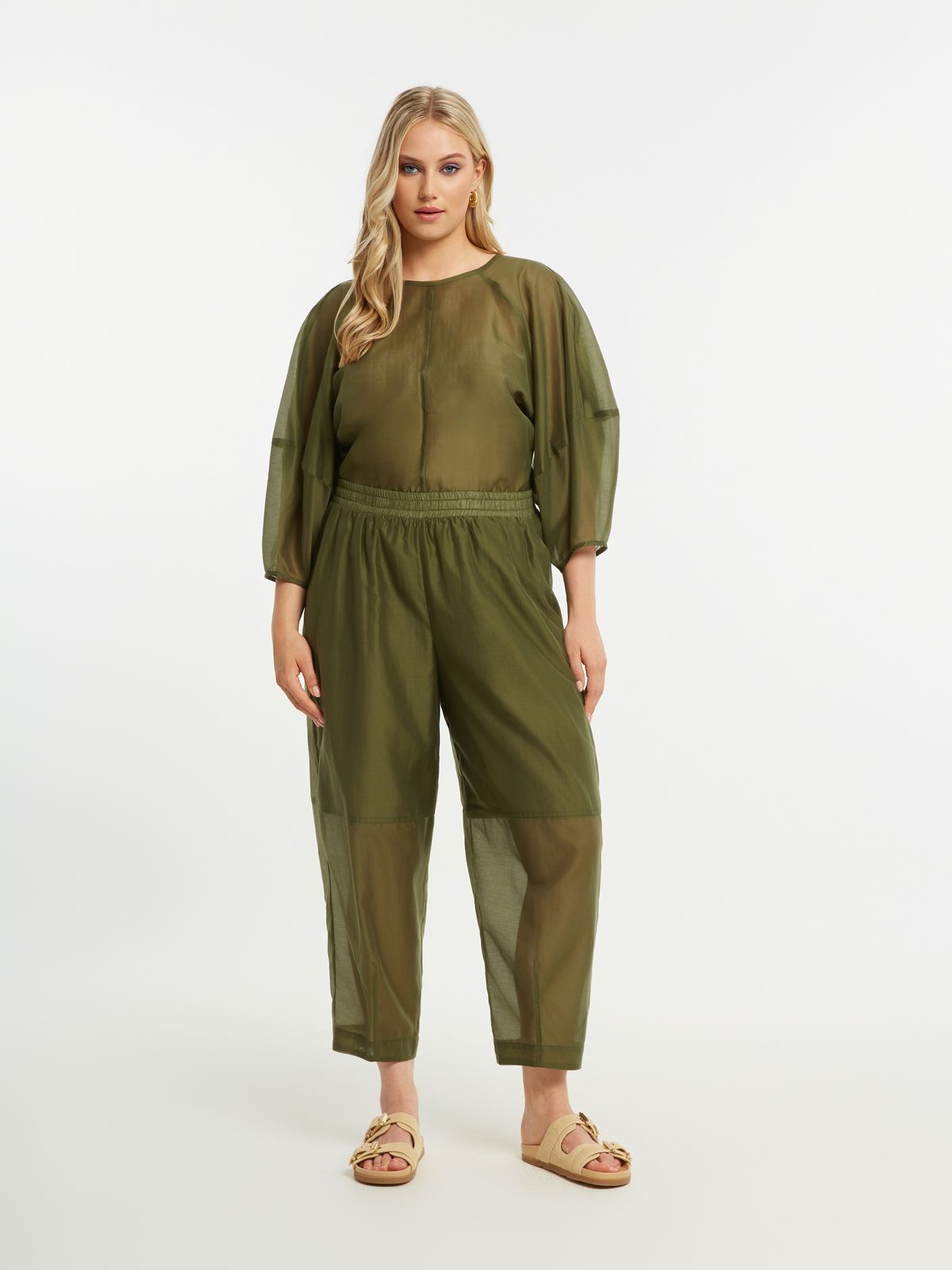 Sheer tapered pants with inside lining