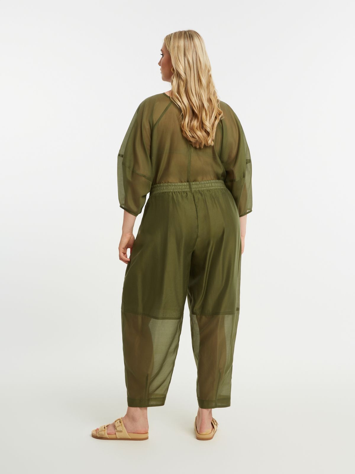 Sheer tapered pants with inside lining