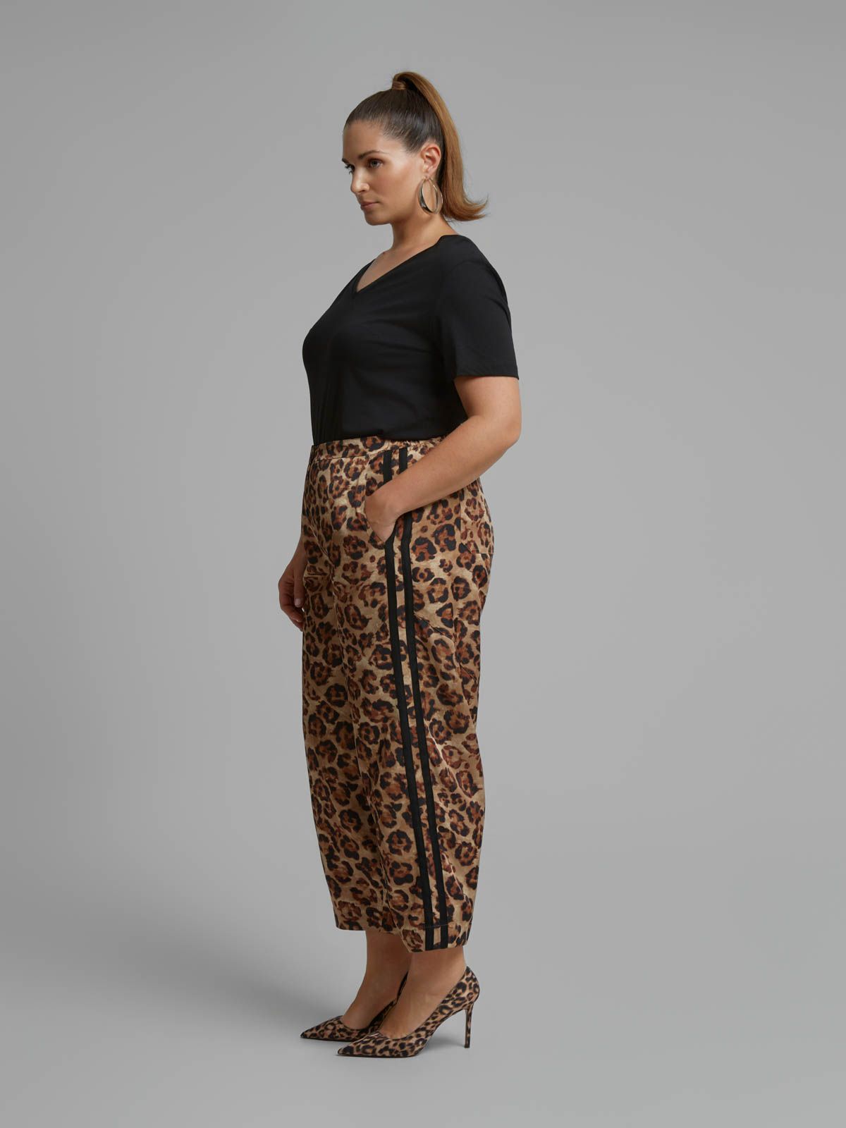 Leopard print tapered trousers with side stripe detail
