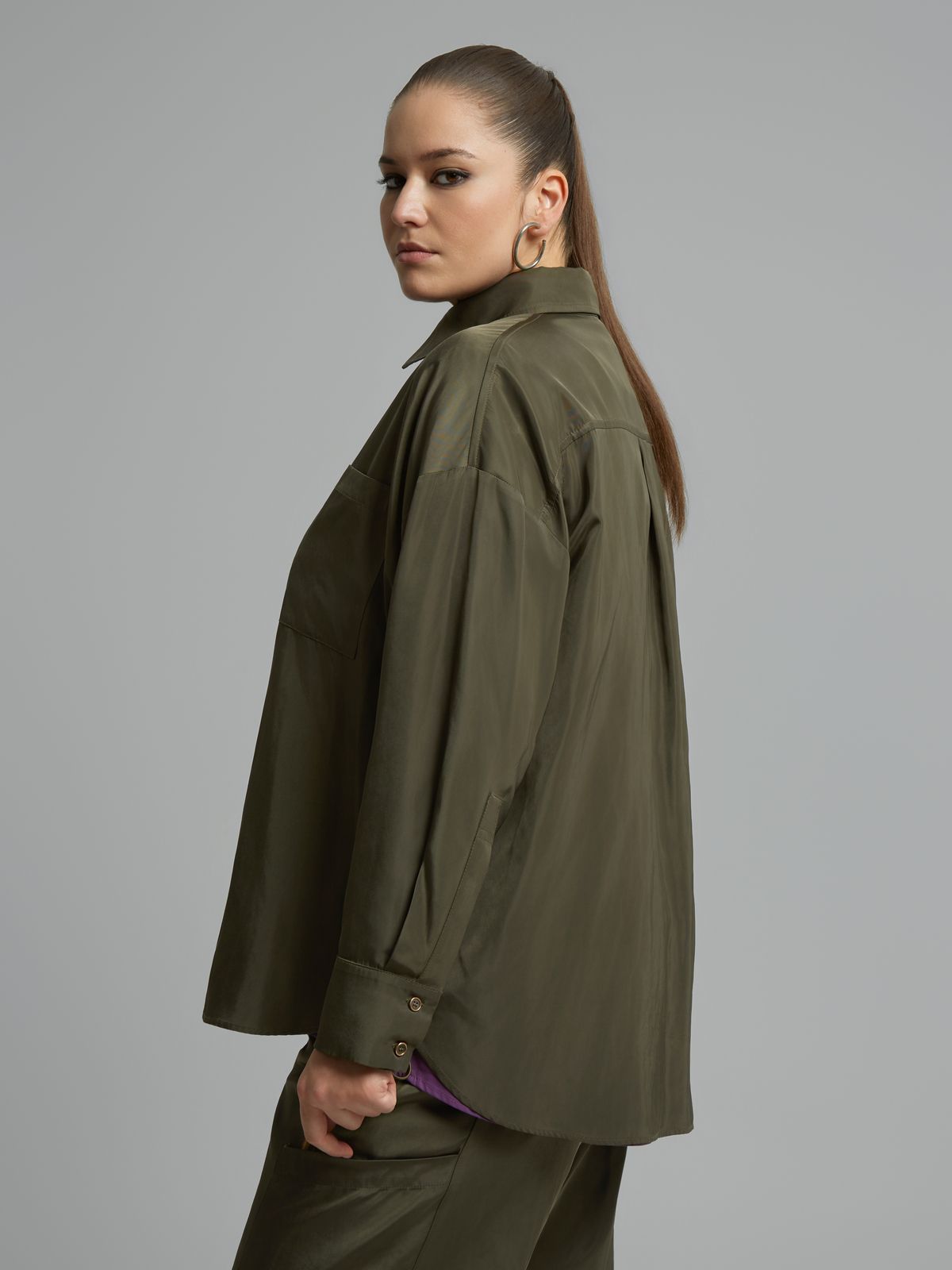 Parachute-fabric shirt with front zipper and colorful stripe detail