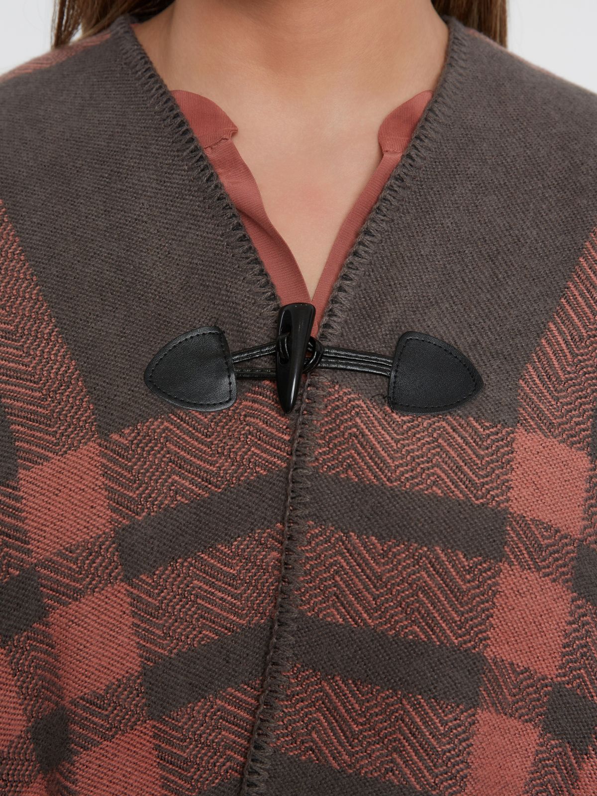 Plaid poncho with toggle closure
