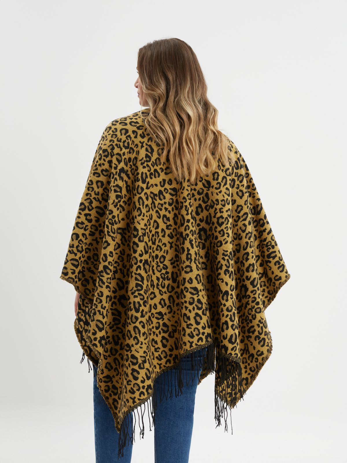 Leopard print fringe cape