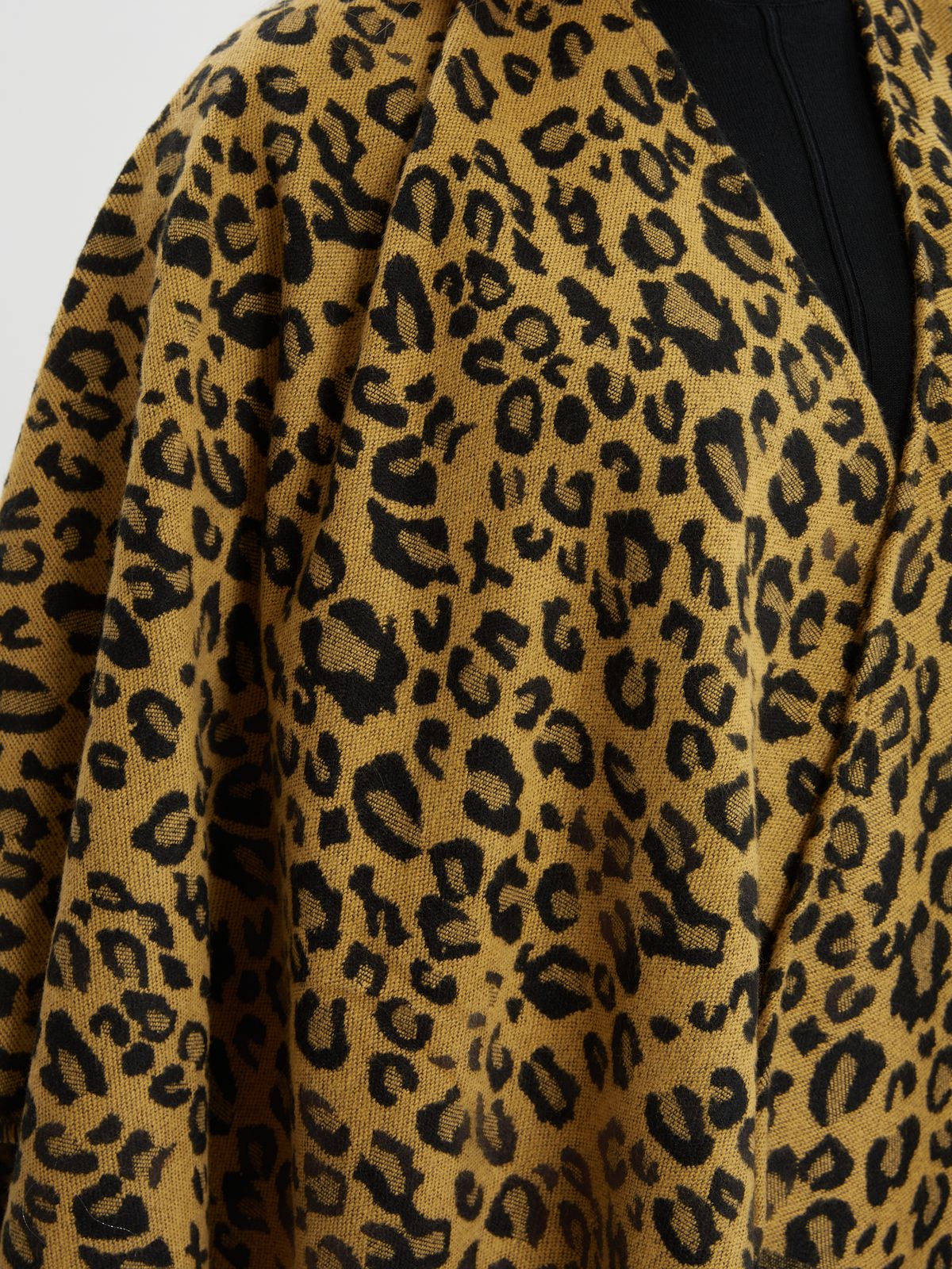 Leopard print fringe cape