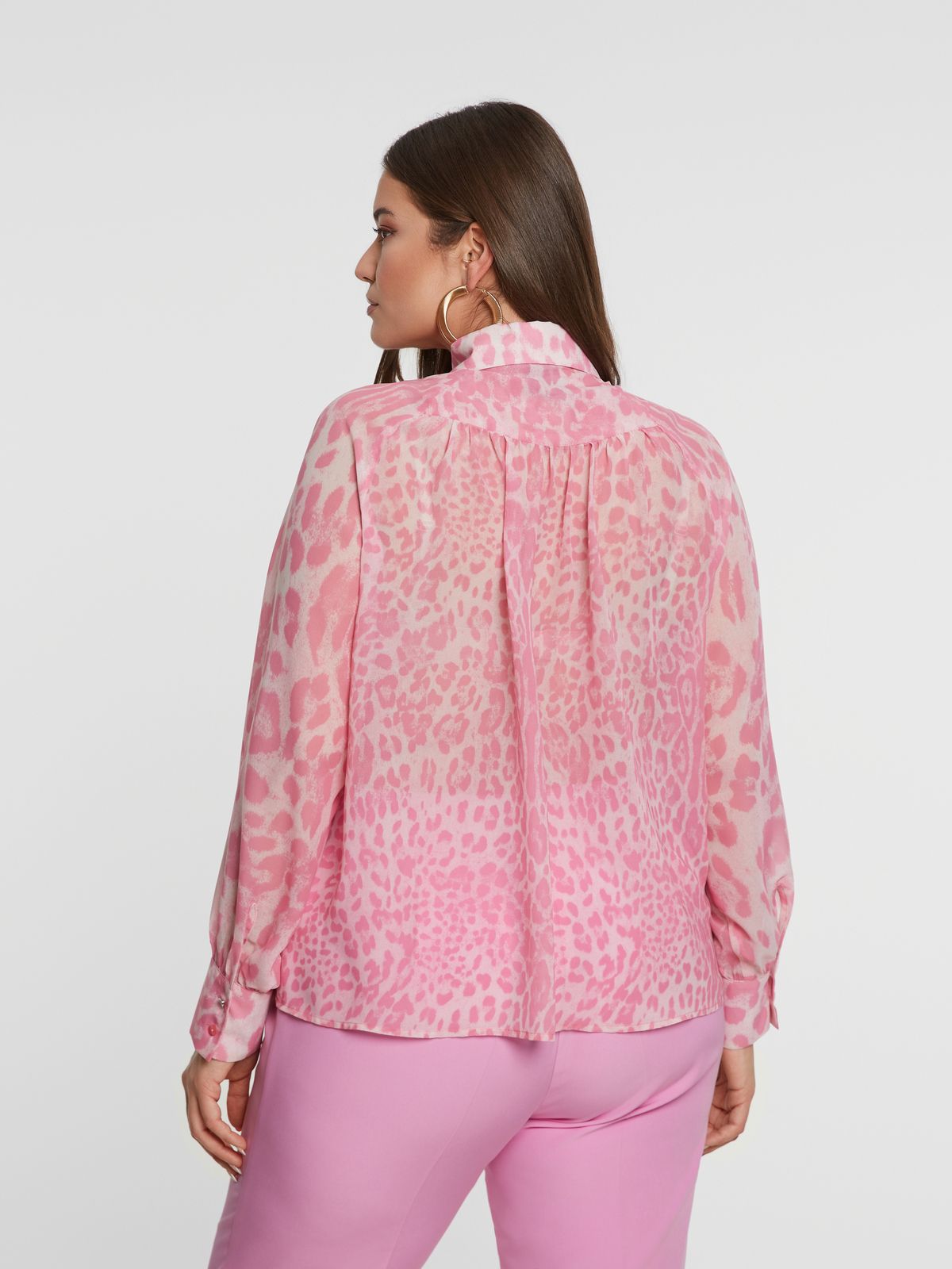 Ruffled button-up shirt in animal print
